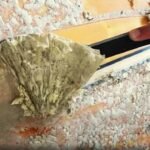 How to remove old wax from a surfboard?