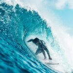 how to go under a wave on a surfboard