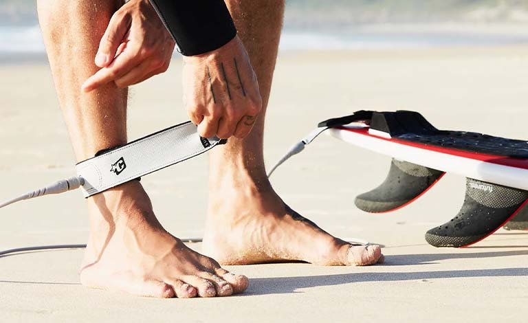 How to Attach a Leash to a Surfboard