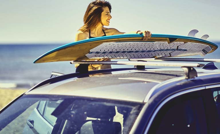 How to Strap a Surfboard to Roof Racks