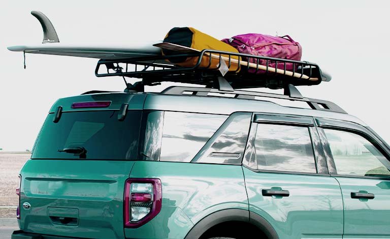 How to Strap a Surfboard to Roof Racks